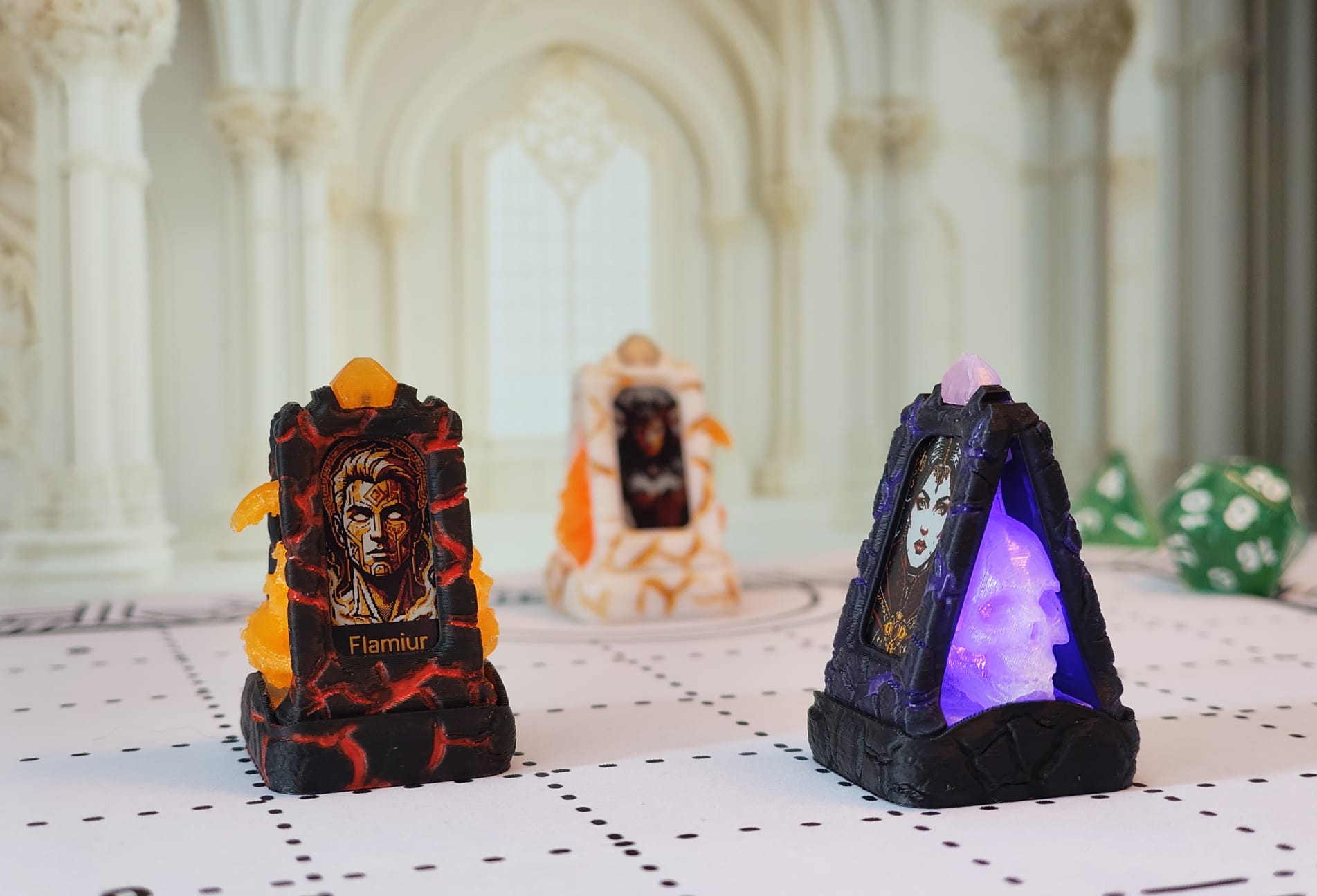 Three Totem Forge minis with crisp character portraits on their screens